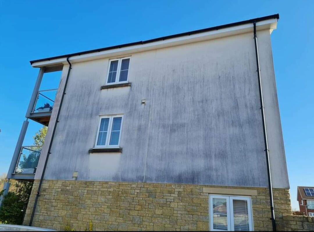 Stained Render On Block Of Flats
